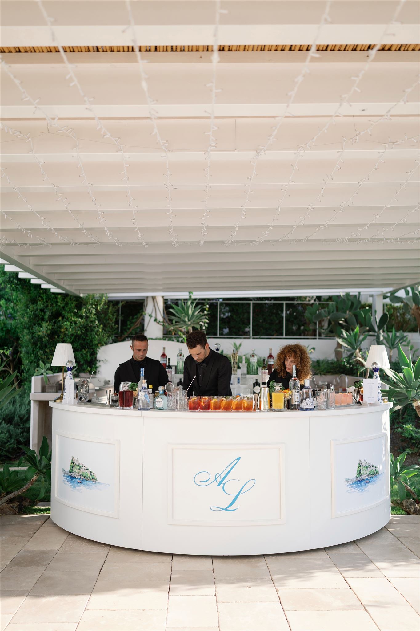 Custom white round bar setup for luxury outdoor wedding in Ischia