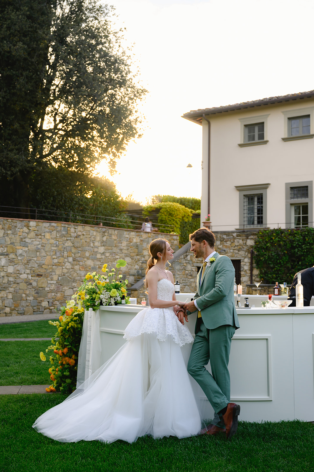 Custom round cocktail bar for weddings and events in Italy. A unique circular bar setup designed to impress international guests. Fully customizable with Italian-inspired details.