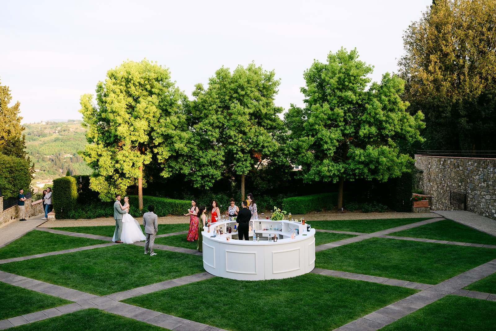 Discover our exclusive round bar, a custom-designed setup for weddings and private events in Italy. Fully personalizable and perfect for adding a wow effect to your cocktail hour or after-dinner party.